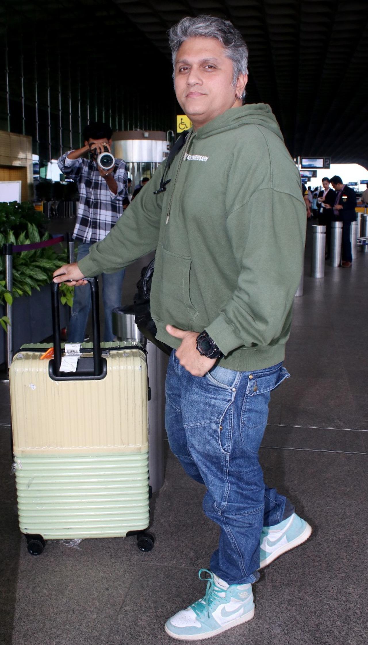 Saiyaara filmmaker Mohit Suri was also spotted at the airport on Tuessday morning as he headed out of the city in style sporting a olive gree sweatshirt, blue jeans and white sneakers. 